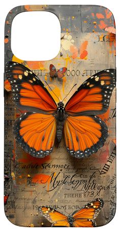 an orange and black butterfly on a piece of paper with words written in the background