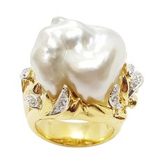 South Sea Pearl with Diamond 0.31 carat Ring set in 18 Karat Gold Settings Width: 2.6 cm Length: 2.0 cm Ring Size: 53 Total Weight: 25.71 grams "We first opened doors in 1980 when it was then situated in the vicinity of the Victory Monument; a small and modest storefront with a couple of counters. From its humble beginnings to where it stands today, our company has proven its abilities as a jeweler. Since the beginning, we have been supplying fine quality pieces to dealers, wholesalers and custo Wide Gold Ring, Pearl Cocktail Ring, Art Deco Pendant Necklace, Fine Pearl Jewelry, Pearl Gifts, Diamond Ring Set, Woman Jewelry, Pearl And Diamond Ring, Diamond Cocktail Rings