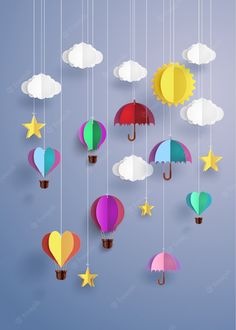 colorful hot air balloons with stars and clouds hanging from strings on the blue sky background