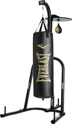 a black punching bag on a stand with an iron bar attached to the back of it