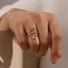 Get ready to snake your way into fashion with our Serpent Vine Ring! This adjustable twist ring features a bold and majestic serpent design, adding a touch of daring and playfulness to any outfit. Don't be afraid to let your wild side shine! Snake Ring Gold, Queen Rings, Serpent Ring, Type Style, Geometric Type, Shape Geometric, Snake Jewelry, Female Style, Ringe Gold