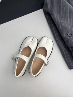 White Mary-Janes Tabi: A Fusion of Vintage and Modern ✨ Why You'll Love Them: Rich Brown Hue:Our White Mary-Janes Tabi Shoes offer a unique twist on the classic Mary-Janes silhouette, featuring the distinctive Tabi split-toe design. These shoes aren't just about making a statement; they’re crafted for comfort and versatility, making them an essential addition to any wardrobe. Comfort & Durability: Crafted for all-day wear, ensuring you look and feel great. Distinctive Tabi Design: A unique blend White Mary Janes, Tabi Socks, Tabi Shoes, Toe Designs, Modern Fashion, White Shoes, Shoe Sale, Sock Shoes, Beach Bag