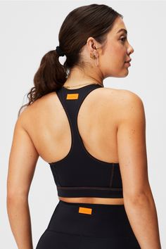 Zip-Front Racerback Shaping Swim Top Fabletics black/orange female Activewear >> Womens >> Swim >> Tops regular Swim 4-Way Stretch/Removable Bra Cups Zip-front racerback swim top. Stylish Workout Clothes, Female Activewear, Stylish Activewear, Kate Hudson, Sportswear Women, Go Ahead, Bra Cups, Swim Top, Model Photos