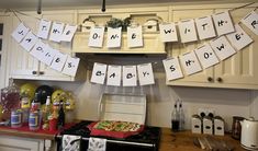 the kitchen is decorated with cards that spell out words