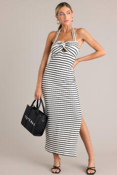 Elevate your style with our Contrast Couture Black Stripe Halter Maxi Dress. Featuring a playful halter top and contrasting stripes, this dress is perfect for any occasion. Show off your unique fashion sense and turn heads wherever you go. This stripe maxi dress features a self-tie halter neckline, twist detailing in the bust, a chest cutout, an open back, a textured material, and a side slit. Halter Bridesmaid Dress, Preppy Girls, Rush Dresses, Cardigan Crop Top, Halter Maxi Dress, Dress Bra, Halter Maxi, Striped Maxi, Halter Maxi Dresses