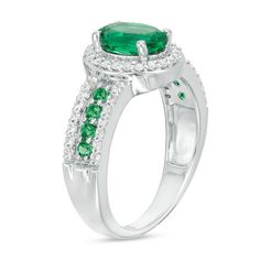 Amp up the fashion volume with this gorgeous fashion ring. Crafted in sterling silver, this resplendent design showcases an 8.0 x 6.0mm oval-shaped lab-created verdant-green emerald wrapped in a shimmering frame of petite lab-created white sapphires. The luxurious shank sparkles with a row of 1.9mm created emeralds bordered in petite created white sapphires. Polished to a bright shine, this choice is a standout style. Custom-made to fit her ring size. Sterling silver rings cannot be resized after purchase. Frame Ring, Her Ring, Resize Ring, Lab Created Emerald, Peoples Jewellers, Emerald Stone, Fashion Ring, Sapphire Stone, Precious Jewelry