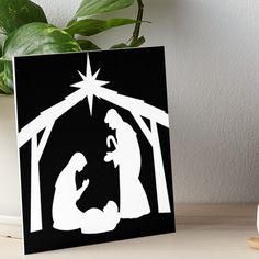 a nativity scene with the birth of jesus and baby jesus art board print on canvas