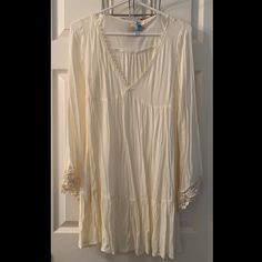 Never Worn. Still Has Original Tags Attached. Very Light & Flowy. Will Most Likely Need To Be Worn With A Slip (It’s Fairly See-Through). The Bell-Sleeves Make This Dress Super Bohemian. Would Look Amazing With A Pair Of Strappy Sandals Or Cute Wedges! Flowy V-neck Boho Dress With Lace Trim, Bohemian Long Sleeve Dress With Lace Trim, Flowy Rayon Dress With Lace Trim, Casual Rayon Dresses With Lace Trim, Cream Long Sleeve Mini Dress For Beach, Long Sleeve Boho Dress With Lace Trim For Vacation, Casual Beige Long Sleeve Boho Dress, Cream V-neck Mini Dress With Lace Trim, Flowy Cream Tunic Dress