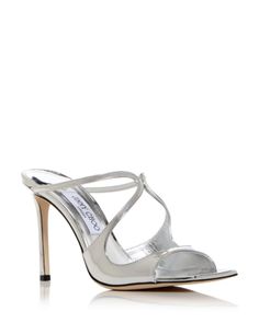 Jimmy Choo Women's Anise 95 High Heel Slide Sandals Designer Patent Leather Mules For Evening, Luxury Patent Leather Mules For Evening, Modern Metallic Leather Heels For Evening, Elegant Formal Heels In Metallic Leather, Elegant Metallic Leather Heels For Formal Occasions, Luxury Mules With Wrapped Heel For Cocktail, Modern Metallic Sandals For Evening, Luxury Metallic Sandals For Formal Occasions, Luxury Mules With Wrapped Heel For Formal Occasions