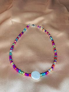 Coin shaped shell pearls are made from natural shell pieces 14mm and 3mm thick Metallic Seed Bead Bead Necklace For Men, Metallic Rainbow, Coin Pearls, Pearl Choker Necklace, Necklace For Men, Seed Bead Necklace, Indie Fashion, Pearl Choker, Bead Necklace