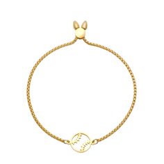 a gold bracelet with the word love written on it and a small heart in the middle