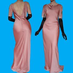 "Dusky pink chiffon evening gown with a low back, ribbon strap detail & a cowl neckline UK 10 ✨Condition: No faults or marks ✔️ ✨Size: UK 10 ✨Measurements:  Waist - 30\" Bust - 36\" Hips - 40\" ✨Label: Consortium  ✨Length: Maxi - floor length on the 5'8 model  ✨Model size: 10 ✨Model height: 5'8 Any questions please do not hesitate to ask These are vintage items so are in a used condition and may have loose stitching or marks however all noticeable flaws will be shown No Returns" Pre-draped Evening Dress With Cowl Back For Party, Formal Evening Dress With Bias Cut And Cowl Back, Pre-draped Pink Silk Evening Dress, Formal Pre-draped Backless Evening Dress, Formal Pre-draped Pink Gown, Silk Evening Dress With Cowl Back For Formal Occasions, Formal Silk Evening Dress With Cowl Back, Party Evening Dress With Bias Cut And Low Back, Pre-draped Pink Evening Gown