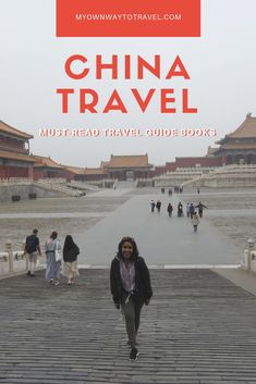 a woman walking across a stone walkway with the words china travel must read travel guide books