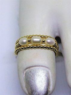 14kt Solid Gold Toe Rings White Pearl Toe Ring Stacking Toe Ring 14k Gold Thumb Ring Triple Rings Real 14kt Gold Toe Rings BuyAny3+Get1Free 14kt Solid Gold Toe ring is made with Real Genuine 14kt Gold Beads & Genuine Freshwater Pearls. These are stretchy & very comfortable. Select Size needed. If ordering for other than toe, please send a message with your ring size stated. * Buy Any 3 items + get 1 additional item for Free. This listing represents 1 item. * Do Not Click on Buy for the f Gold Thumb Ring, Gold Thumb Rings, Gold Toe Rings, Triple Ring, Thumb Ring, Toe Ring, Ring Stacking, Thumb Rings, Body Jewellery