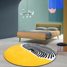 a bed sitting in a bedroom next to a yellow rug