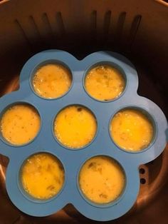 an image of eggs being cooked in the pot