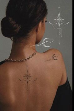 a woman with a cross tattoo on her back