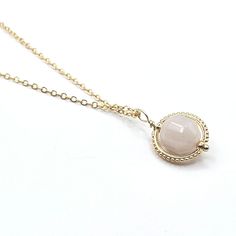 Embrace the loving energy of rose quartz with this stunning gold spinner pendant with an ornate 18k gold plated frame. This handmade piece radiates elegance and the soft, soothing vibes of rose quartz, making it a perfect addition to your jewelry collection or a thoughtful gift for someone special. Features: Gemstone: Natural rose quartz Chain: Gold Vermiel chain included (18 inches) Pendant Size: Approximately 12 mm Benefits of Rose Quartz: Known as the stone of unconditional love, rose quartz Loving Energy, Rose Quartz Pendant, Natural Stone Jewelry, Love Rose, Chain Gold, Quartz Rose, Spiritual Jewelry, Quartz Pendant, Healing Crystal