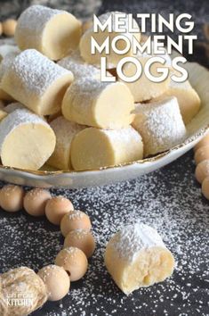 a plate full of cookies and marshmallows with the words melting moment logs