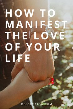 two people holding hands with the words how to manfest the love of your life