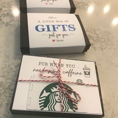 two starbucks gift boxes tied with twine