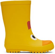 Rubber boots in yellow. · Cap toe · Graphic printed at vamp · Bonded jersey lining · Lugged rubber sole Made from cruelty-free, non-animal materials. Supplier color: Yellow EU Size: child's foot length 25: 6.1 / 15.5 cm 26: 6.3 / 16 cm 27: 6.7 / 17 cm 28: 7.1 / 18 cm 29: 7.3 / 18.5 cm 30: 7.5 / 19 cm 31: 7.7 / 19.5 cm 32: 7.9 / 20 cm 33: 8.3 / 21 cm 34: 8.5 / 21.5 cm 35: 8.7 / 22 cm 36: 8.9 / 22.5 cm 37: 9.1 / 23 cm 38: 9.4 / 24 cm 39: 9.6 / 24.5 cm Rubber Boots, Stella Mccartney Kids, Rain Boots, Apparel Accessories, Stella Mccartney, Kids Shop, Women Wear, Yellow, Outfit Accessories