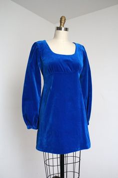 She wore blueeee velvetttt... adorable blue velvet mini dress from the 1960s!! Metal zipper down the back. Empire waist and baby doll silhouette with long sleeves. Just wonderful! Label: none Measurements: { xsmall } Bust: 33"  Under Bust: 29" Hips: 36"  Length: 30" Sleeve Length: 24" There is also a hem with 4" if you needed a little more length.  Condition: excellent vintage condition with minor signs of wear - sold as found. washed and ready to wear ☆Shop more☆ http://www.trunkofdresses.com/ Blue Velvet Cocktail Dress, Royal Blue Velvet Dress, Blue Velvet Mini Dress, Navy Blue Velvet Dress, 60s Cocktail Dress, Vintage Dress Blue, Mimi Dress, Velvet Shift Dress, Velvet Sheath Dress