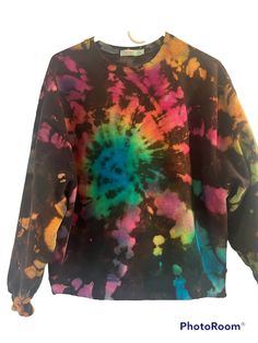 This is a black cotton blend crew neck sweatshirt in a rainbow pastel swirl.  Crew neck.  Very soft and comfortable. Can be worn with jeans or sweats.  There will be some variation with the finished product.  Larger sizes available  Machine wash cold and hang dry to prevent shrinking Trendy Multicolor Relaxed Fit Sweatshirt, Tie Dye Crew Neck Sweatshirt For Spring, Trendy Tie Dye Sweatshirt With Relaxed Fit, Trendy Tie Dye Sweatshirt Relaxed Fit, Casual Multicolor Hand Dyed Sweatshirt, Rainbow Long Sleeve Sweatshirt For Fall, Long Sleeve Rainbow Sweatshirt For Fall, Hand Dyed Multicolor Relaxed Fit Sweatshirt, Trendy Oversized Tie Dye Sweatshirt