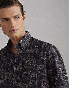 Paisley basic fit shirt with button-down collar A retro-inspired pattern in the season's colors updates the classic style of this button-down collar shirt. The pure cotton fabric is enriched with the Paisley motif, while the basic fit, with comfortable, straight lines, guarantees ease and versatility. Classic Paisley Print Button-up Shirt, Elegant Shirt With Button Closure And Patterned Design, Classic Patterned Top For Formal Occasions, Elegant Patterned Cotton Shirt, Classic Patterned Shirt With Spread Collar, Classic Patterned Formal Shirt, Classic Shirt With Paisley Print And Spread Collar, Elegant Patterned Button-up Shirt, Casual Shirt With Paisley Print And Spread Collar