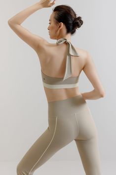 Dance Halter Sports Bra Fitted Beige Activewear, Beige Fitted Activewear Sportswear, Beige Fitted Sportswear Activewear, Fitted Beige Sports Bra Athleisure, Fitted Beige Sports Bra Athleisure Style, Chic Stretch Activewear For Sports, Chic Stretch Activewear, Fitted Beige Athleisure Sports Bra, Fitted Beige Activewear For Pilates