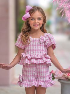 Make picnics and playdates extra fashionable with our pink gingham top and shorts set. This photo-ready pairing makes your little diva stand out in your next family pics. Get ready for the compliments because everyone will be impressed! Shorts design offers maximum coverage to give her the confidence to move and play. Playful Gingham Sets For Spring, Pink Ruffled Sets For Spring, Summer Plaid Sets With Short Sleeves, Summer Plaid Short Sleeve Sets, Spring Pink Ruffled Set, Summer Gingham Short Sleeve Sets, Summer Gingham Sets With Short Sleeves, Cute Plaid Sets For Spring, Cute Plaid Spring Sets