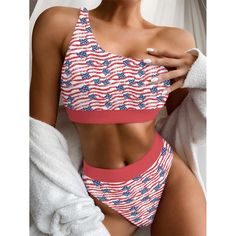 Embrace the spirit of summer and flaunt your patriotic side with our "American Glory Single-Shoulder Bikini Set." Designed for the fashion-forward and free-spirited, this ensemble is a celebration of style and freedom. The bikini top's one-shoulder silhouette is both trendy and comfortable, featuring chest support and lining for an impeccable fit. Paired with a flirtatious wrap dress that boasts a stylish side split, this duo is sure to make heads turn at any beach or poolside event. The America American Flag Print Swimwear For Pool In Summer, Fitted American Flag Print Swimwear For Beach Season, American Flag Print Swimwear For Summer Pool, Patriotic Swimwear For Summer Vacation, Summer Flag Print Swimwear For Vacation, Flag Print Swimwear For Summer Vacation, Summer Flag Print Swimwear For Poolside, Beachwear Swimwear For Vacation On 4th Of July, Patriotic Fitted Swimwear For Beach Season