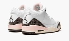 the nike air jordan iv is decorated with leopard print and pink accents on the upper part