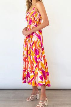 Bright Vibrant Abstract Sleeveless Smocked Bodice Summer Maxi Dress This is a timeless dress that is simple but definitely not basic.Vibrant bright colors in abstract watercolor artistic print.Easy to dress up with espadrille heel sandals for a bohemian style, down with ballet flats or cowboy boots.Wide adjustable spaghetti shoulder straps.Elasticized smock bodice that's form fitting and stretchy.Flowing and breathable summer worthy tiered A-line maxi with a wide bottom hem.Girl-next-door femini Smocked Maxi Dress, Stylish Maxi Dress, Maxi Sundress, Maxi Robes, Sleeveless Maxi Dress, Style Chic, Summer Maxi Dress, Printed Maxi, Tiered Dress