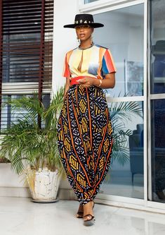 Pantalon Orange, African Pants, Parachute Pant, Clothes Fabric, African Fashion Modern, African Wear, African Inspired, African Attire, African Fabric