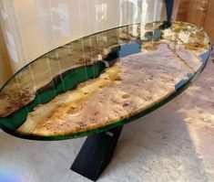 a glass table that has been made to look like it is in the middle of a room