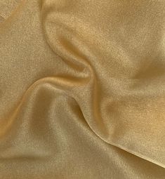 an image of a gold colored fabric