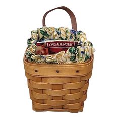 a basket filled with lots of food on top of a white background