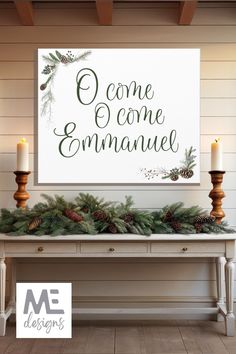 a christmas mantle with candles, pine cones and greenery on it in front of a sign