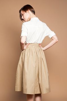 Beige Cotton Midi Skirt by Mrs Pomeranz by mrspomeranz on Etsy Vintage Gathered Midi Skirt, Vintage Full Skirt Bottoms With Buttons, Beige Midi Skirt For Daywear, Vintage Long Skirt With Relaxed Fit, High Waist Pleated Skirt For Daywear, High Waist Lined Skirt For Daywear, Classic Long Skirt For Daywear, Vintage Fashion Flared Lined Skirt, Vintage Full Lined Skirt