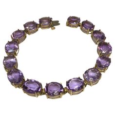 10K gold 11 mm by 9 mm 38 Ct Oval Natural Amethyst Tennis Bracelet Women 8 inch 15 stones, 11 mm by 9 mm, oval amethysts approximately 38 Carats 8 inch long Weighting 19.4 gram All in good condition, no damage, no evidence of repairs, see pictures Bracelet Tennis, Bracelet Women, Tennis Bracelet, 10k Gold, See Picture, Womens Bracelets, Jewelry Bracelets, Tennis, Amethyst