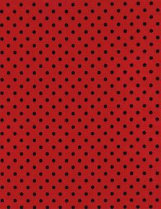 a red background with black polka dots