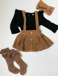 Fall in love with the Fallon Corduroy Suspender Skirt from @baileysblossoms, one of our most popular styles. Add some cozy knee socks + a bow for even more cuteness 🤎 . . #baby #cute #adorable #toddler #cutebaby #babyshower #babyoutfit #babystyle #babiesofinstagram #babieswithstyle #mom #mama #babygirl #girlmom #fallbabyfashion #babyboutique #bravelittlelamb #shopsmall #smallbusiness Fall Photo Outfits, Baby Suspenders, Newborn Mom, Girl Fashion Style, Baby Fits, Suspender Skirt, Popular Styles, Fall Baby