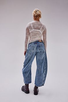 So bold barrel jeans from our We The Free collection featured in a mid-rise fit with subtle distressed detailing and wide-legs that taper at the ankle. **Fit:** Mid-rise, slouchy, relaxed fit, wide-legs, ankle-length; this style runs slightly large so we recommend sizing down one size **Features:** Zip-fly and button closure, rigid denim fabrication, belt loops at waistband, 4-pocket style, subtle distressing, tapered bottom hem, seam detail throughout **Why We | We The Free Lucky You Mid-Rise B Barrel Jeans, Lucky You, Light Beam, Loungewear Shorts, Baggy Fits, Casual Wardrobe, Boho Outfits, Effortless Style, Jacket Dress