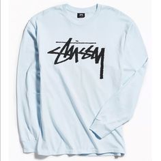 Nwot Urban Outfitters Stussy Old School Logo Long Sleeve Tee- Long Sleeve T-Shirt From Stussy Featuring A Logo Across The Chest. Heavyweight Cotton Is Cut In A Standard Fit Complete With Ribbed Banding At The Collar + Cuffs. Stussy Is A California-Based Streetwear Label That Delivers A Collection Of T-Shirts, Hoodies And Accessories, All Emblazoned With Shawn Stussy's Iconic Signature. Content + Care - Cotton - Machine Wash - Imported Tag Has Been Marked To Prevent In Store Returns H-02-24-22 Light Blue Cotton Streetwear Tops, Light Blue Graphic Top For Streetwear, Light Blue Graphic Print Top For Streetwear, Light Blue Relaxed Fit Top For Streetwear, Trendy Blue Tops For Streetwear, Summer Long Sleeve Shirt With Logo Print, Blue Graphic Print Long Sleeve Tops, Light Blue Tops For Spring Streetwear, Casual Light Blue Long Sleeve T-shirt