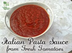 italian pasta sauce from fresh tomatoes in a white bowl on top of a tablecloth