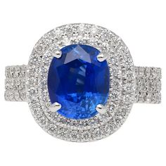 an oval blue sapphire and diamond ring