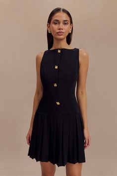 Mackenzie Sleeveless Pleated Mini Dress - Black Luxury Belted Mini Dress For Work, Button Dress Formal, Luxury Pleated Mini Dress For Work, Luxury Structured Mini Dress For Work, Luxury Bow Dresses For Work, Luxury Pleated Hem Dress For Work, Luxury Fit And Flare Dress With Box Pleat, Luxury Mini Dress With Pleated Sleeves For Work, Luxury Workwear Dresses With Bow Detail