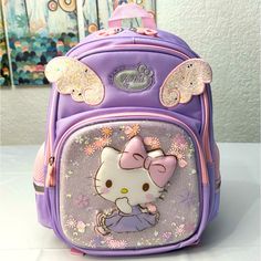 Hello Kitty Backpack, Perfect School Bag For Students. Size: 35cm/ 17in Length X 26cm/ 13in Wide. Cute Purple Backpack For Students, Cute Purple Standard Backpack, Cute Standard Purple Backpack, Purple Backpack For End Of School Year, Purple Standard Backpack For End Of School Year, Cute Purple Backpack, Accessories Hello Kitty, Hello Kitty Backpack, Kitty Backpack