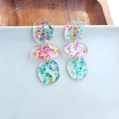 Show off your flair with Florence! These abstract acrylic statement earrings in fun confetti colors add a bit of edge to any look. Dare to be unique - wear Florence and get noticed! Hypoallergenic stainless steel posts Lightweight acrylic Modern Plastic Earrings For Parties, Multicolor Plastic Earrings For Party, Be Unique, Shopping Basket, Abstract Acrylic, Statement Earrings, Confetti, Florence, Stainless Steel